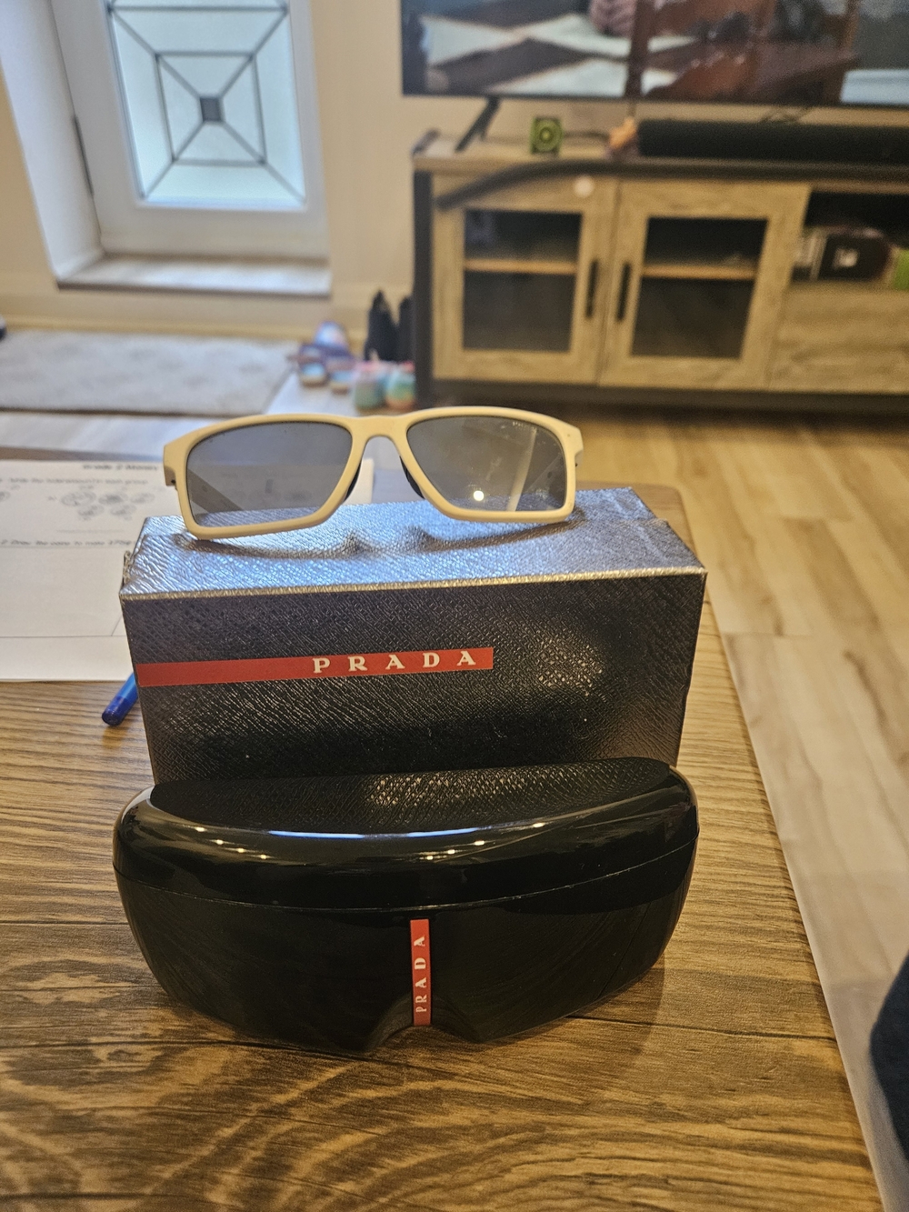 Prada White Frame Sunglasses with Dark Lenses